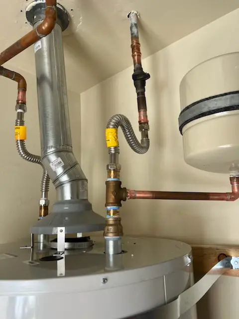 Water heater installation and plumbing repair in Goodrichville